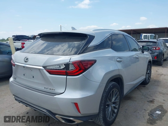 2018 Lexus RX 350 with VIN 2T2BZMCA4JC163019, listed as a IAAI auction lot 42033459 with 96,586 mi miles and . Bid and sale history available at DreamBid. Image 4.