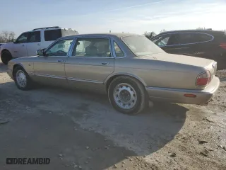 1999 Jaguar XJ with VIN SAJKX6040XC857312, listed as a Copart auction lot 84918704 with 75,425 mi miles and Clean Title. Bid and sale history available at carsss.com. Image 2.
