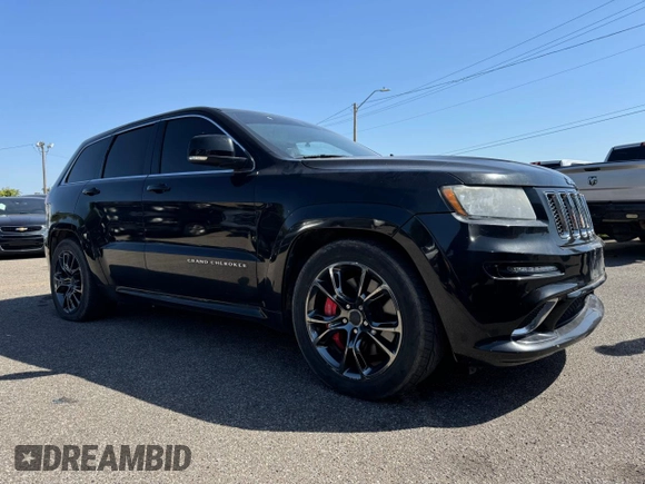 2012 Jeep Grand Cherokee SRT8 with VIN 1C4RJFDJ2CC111226, listed as a Copart auction lot 74449424 with 113,515 mi miles and Clean Title. Bid and sale history available at carsss.com. Image 1.
