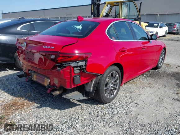 2020 Alfa Romeo Giulia with VIN ZARFAMAN1L7636002, listed as a IAAI auction lot 42121135 with 55,510 mi miles. Bid and sale history available at carsss.com. Image 4.