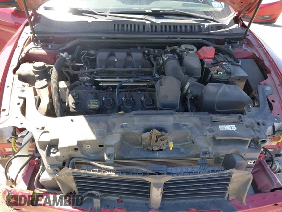 2013 Ford Taurus SEL with VIN 1FAHP2E8XDG231807, listed as a IAAI auction lot 41774166 with 120,639 mi miles and . Bid and sale history available at carsss.com. Image 10.