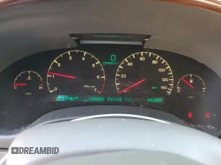 2002 Cadillac DeVille DHS z VIN 1G6KE54Y62U248629, wystawiony jako Copart lot #79825284 z przebiegiem 99 568 mil mil oraz Szkoda całkowita • Salvage title. Historia ofert i sprzedaży dostępna na DreamBid. Obrazek 9.