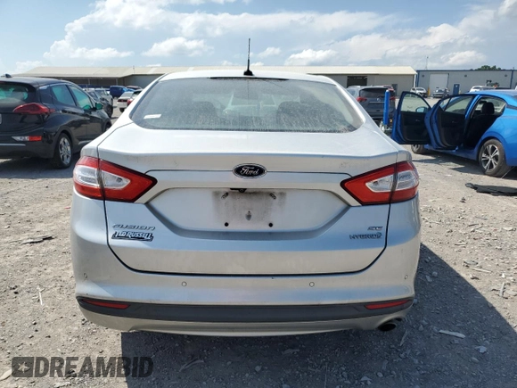 2013 Ford Fusion SE Hybrid z VIN 3FA6P0LU3DR336838, wystawiony jako Copart lot #56205445 z przebiegiem 209 164 mil mil oraz Czysty tytuł • Clean title. Historia ofert i sprzedaży dostępna na DreamBid. Obrazek 6.