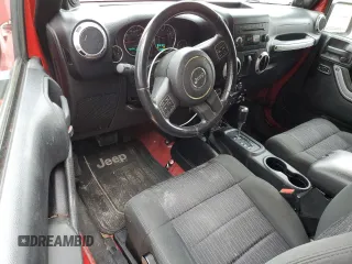 2012 Jeep Wrangler Arctic z VIN 1C4AJWBG9CL123832, wystawiony jako Copart lot #87376204 z przebiegiem 174 097 mil mil oraz Szkoda całkowita • Salvage title. Historia ofert i sprzedaży dostępna na DreamBid. Obrazek 8.
