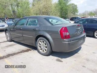 2008 Chrysler 300 Touring with VIN 2C3LA53G48H295678, listed as a IAAI auction lot 42007155 with 218,020 mi miles. Bid and sale history available at carsss.com. Image 3.