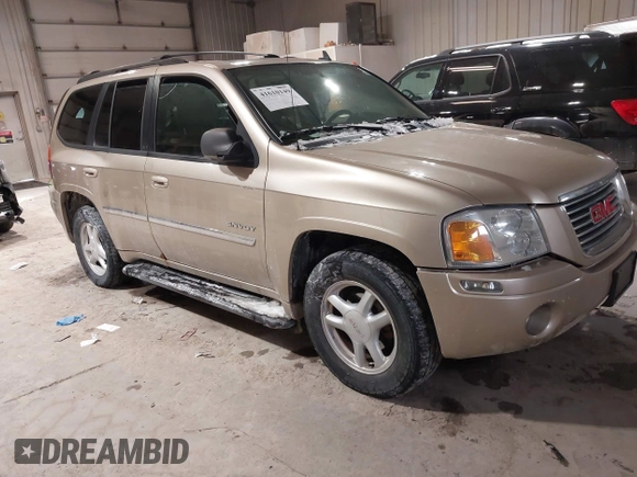 2006 GMC Envoy SLE with VIN 1GKDT13S062160490, listed as a IAAI auction lot 41610149 with 1 mi miles. Bid and sale history available at carsss.com. Image 1.