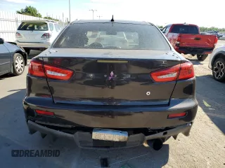 2008 Mitsubishi Lancer Evolution GSR with VIN JA3AW86V58U049914, listed as a Copart auction lot 62105824 with 129,622 mi miles and Salvage Title. Bid and sale history available at carsss.com. Image 6.