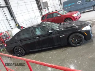 2013 BMW 5 Series 550i xDrive with VIN WBAFU9C56DDY70471, listed as a IAAI auction lot 42158400 with 100,251 mi miles and . Bid and sale history available at carsss.com. Image 13.
