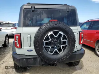 2021 Ford Bronco z VIN 1FMDE5CP4MLA65927, wystawiony jako Copart lot #74809974 z przebiegiem 41 296 mil mil oraz Nie do naprawy • Non repairable. Historia ofert i sprzedaży dostępna na DreamBid. Obrazek 6.
