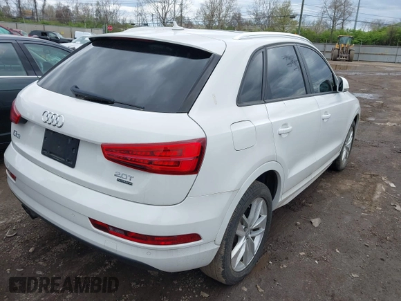 2017 Audi Q3 Premium with VIN WA1ECCFS7HR014647, listed as a IAAI auction lot 42023588 with 211,948 mi miles. Bid and sale history available at carsss.com. Image 4.