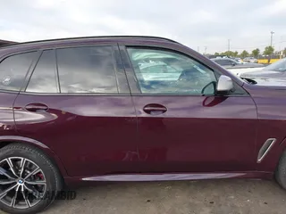 2021 BMW X5 M50i with VIN 5UXJU4C04M9G03418, listed as a IAAI auction lot 40705167 with 24,073 mi miles and . Bid and sale history available at DreamBid. Image 14.