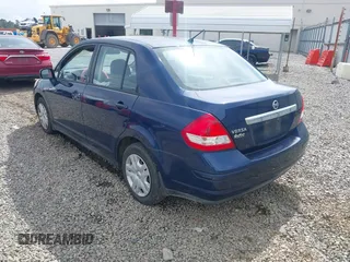 2011 Nissan Versa S with VIN 3N1BC1AP2BL408977, listed as a IAAI auction lot 42524102 with 195,285 mi miles and . Bid and sale history available at DreamBid. Image 3.