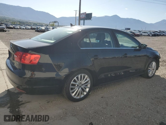 2014 Volkswagen Jetta TDI w/Premium with VIN 3VWLL7AJ2EM363857, listed as a Copart auction lot 54721665 with 134,225 mi miles and Salvage title. Bid and sale history available at DreamBid. Image 3.