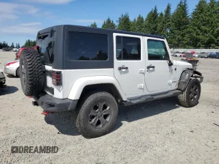 2014 Jeep Wrangler Unlimited Sahara z VIN 1C4BJWEG8EL188271, wystawiony jako Copart lot #59972535 z przebiegiem 130 314 mil mil oraz Szkoda całkowita • Salvage title. Historia ofert i sprzedaży dostępna na DreamBid. Obrazek 3.