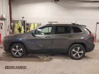 2019 Jeep Cherokee Limited z VIN 1C4PJMDX4KD133303, wystawiony jako IAAI lot #41212933 z przebiegiem 115 332 mil mil oraz . Historia ofert i sprzedaży dostępna na DreamBid. Obrazek 14.