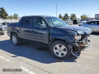 2010 Honda Ridgeline RTL with VIN 5FPYK1F54AB002253, listed as a Copart auction lot 49992265 with 192,841 mi miles and Salvage Title. Bid and sale history available at carsss.com. Image 4.