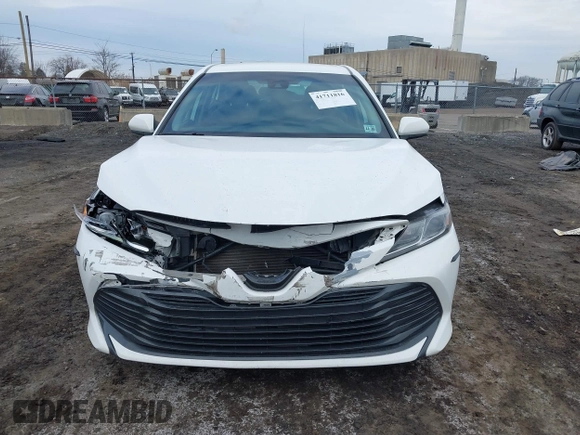 2020 Toyota Camry LE with VIN 4T1C11AK9LU912585, listed as a IAAI auction lot 41711816 with 142,751 mi miles. Bid and sale history available at carsss.com. Image 12.
