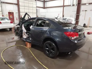 2014 Chevrolet Cruze 2LT z VIN 1G1PE5SB2E7120465, wystawiony jako IAAI lot #41672988 z przebiegiem Nie podano mil oraz . Historia ofert i sprzedaży dostępna na DreamBid. Obrazek 3.