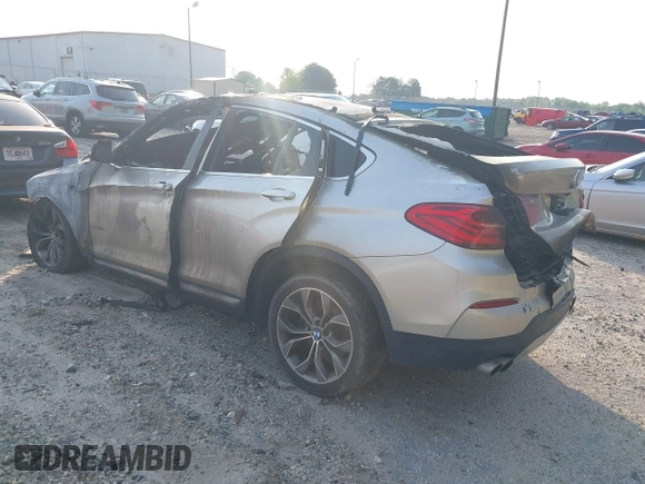 2015 BMW X4 xDrive28i with VIN 5UXXW3C54F0M88902, listed as a IAAI auction lot 42037787 with Not provided miles and . Bid and sale history available at DreamBid. Image 3.