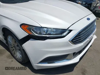 2020 Ford Fusion SE with VIN 3FA6P0LU9LR227928, listed as a IAAI auction lot 42445186 with 59,431 mi miles and . Bid and sale history available at DreamBid. Image 6.