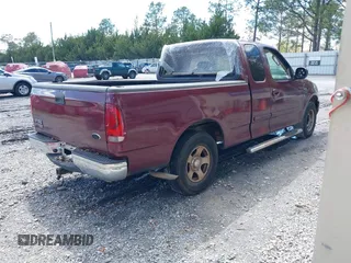 2003 Ford F-150 XL with VIN 1FTRX17203KA95359, listed as a IAAI auction lot 41891118 with 206,393 mi miles. Bid and sale history available at carsss.com. Image 4.