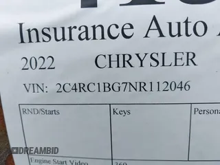 2022 Chrysler Pacifica Touring L with VIN 2C4RC1BG7NR112046, listed as a IAAI auction lot 41336144 with Not Provided miles and . Bid and sale history available at DreamBid. Image 9.