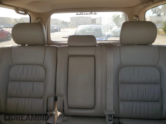 2001 Lexus LX 470 z VIN JTJHT00W213507042, wystawiony jako Copart lot #52634195 z przebiegiem 179 707 mil mil oraz Tytuł czysty. Historia ofert i sprzedaży dostępna na DreamBid. Obrazek 10.