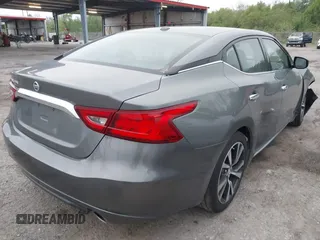 2016 Nissan Maxima SV with VIN 1N4AA6AP7GC449545, listed as a IAAI auction lot 41850689 with 97,859 mi miles and . Bid and sale history available at DreamBid. Image 4.
