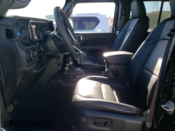 2024 Jeep Wrangler Rubicon with VIN 1C4RJXR69RW132849, listed as a Copart auction lot 48237325 with 18,725 mi miles and Salvage Title. Bid and sale history available at DreamBid. Image 7.