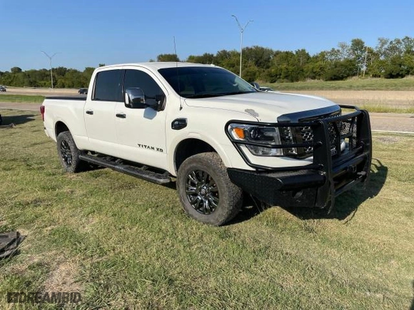 2017 Nissan Titan XD SV with VIN 1N6BA1F45HN547122, listed as a Copart auction lot 75696614 with 0 mi miles and Clean Title. Bid and sale history available at carsss.com. Image 1.