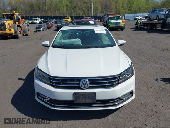 2016 Volkswagen Passat SE z VIN 1VWBT7A38GC016180, wystawiony jako IAAI lot #42132777 z przebiegiem 101 461 mil mil oraz . Historia ofert i sprzedaży dostępna na DreamBid. Obrazek 12.