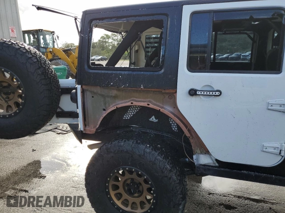 2018 Jeep Wrangler JK Unlimited Sport S with VIN 1C4BJWDG4JL814586, listed as a Copart auction lot 78290194 with 73,125 mi miles and Salvage Title. Bid and sale history available at carsss.com. Image 13.