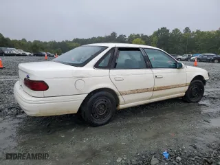 1994 Ford Taurus GL with VIN 1FALP52U5RA152732, listed as a Copart auction lot 70472324 with 52,781 mi miles and Salvage Title. Bid and sale history available at carsss.com. Image 3.