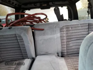 1997 Jeep Grand Cherokee Laredo with VIN 1J4GZ58S1VC741586, listed as a Copart auction lot 77619394 with 0 mi miles and Clean Title. Bid and sale history available at carsss.com. Image 10.