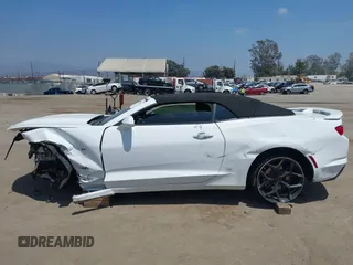 2019 Chevrolet Camaro 1LT with VIN 1G1FB3DX9K0140041, listed as a IAAI auction lot 42799146 with 140,681 mi miles and . Bid and sale history available at DreamBid. Image 14.