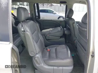 2005 Honda Odyssey EX-L with VIN 5FNRL38745B075486, listed as a IAAI auction lot 42080772 with 197,158 mi miles and . Bid and sale history available at DreamBid. Image 8.