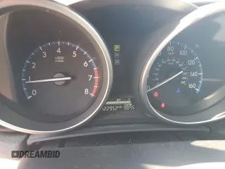 2012 Mazda 3 i Touring with VIN JM1BL1L7XC1534992, listed as a Copart auction lot 63142035 with 122,952 mi miles and Salvage title. Bid and sale history available at DreamBid. Image 9.