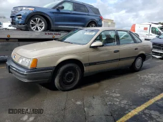 1990 Ford Taurus z VIN 1FACP52U2LG214656, wystawiony jako Copart lot #44146295 z przebiegiem 46 434 mil mil oraz Czysty tytuł • Clean title. Historia ofert i sprzedaży dostępna na DreamBid. Obrazek 1.
