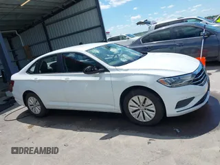 2019 Volkswagen Jetta S z VIN 3VWC57BU7KM200586, wystawiony jako IAAI lot #42609606 z przebiegiem 72 874 mil mil oraz . Historia ofert i sprzedaży dostępna na DreamBid. Obrazek 13.