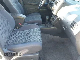 2000 Toyota RAV4 with VIN JT3GP10V9Y0046468, listed as a IAAI auction lot 41864553 with 286,660 mi miles and . Bid and sale history available at DreamBid. Image 5.