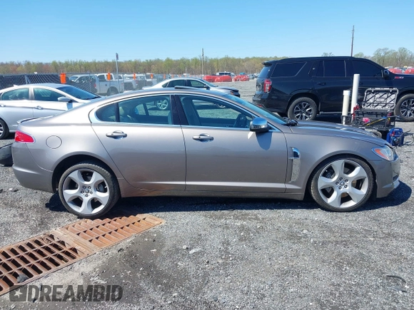 2009 Jaguar XF with VIN SAJWA07CX91R01263, listed as a IAAI auction lot 41994525 with 141,729 mi miles and . Bid and sale history available at DreamBid. Image 13.