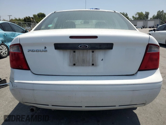 2007 Ford Focus S z VIN 1FAFP34NX7W106482, wystawiony jako Copart lot #57675245 z przebiegiem 170 237 mil mil oraz Szkoda całkowita • Salvage title. Historia ofert i sprzedaży dostępna na DreamBid. Obrazek 6.
