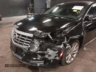 2013 Cadillac XTS Luxury z VIN 2G61R5S34D9102625, wystawiony jako IAAI lot #41668752 z przebiegiem 112 065 mil mil oraz . Historia ofert i sprzedaży dostępna na DreamBid. Obrazek 17.