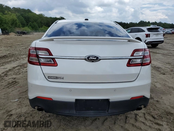 2013 Ford Taurus Limited с VIN 1FAHP2F89DG226774, выставлен на аукционе Copart как лот 57250415 с пробегом 233 149 миль миль и Списание • Salvage title. История ставок и продаж доступна на DreamBid. Изображение 6.
