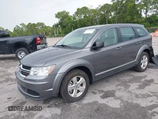 2013 Dodge Journey SE with VIN 3C4PDCAB6DT529949, listed as a IAAI auction lot 42609006 with 38,202 mi miles and . Bid and sale history available at DreamBid. Image 18.