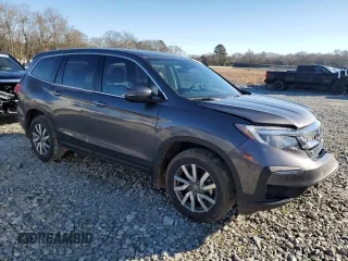 2021 Honda Pilot EX-L with VIN 5FNYF5H57MB027475, listed as a Copart auction lot 42239455 with 66,713 mi miles and Salvage Title. Bid and sale history available at carsss.com. Image 4.