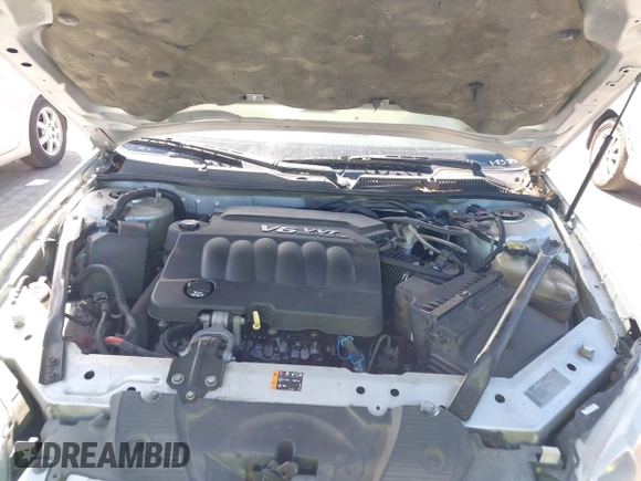 2014 Chevrolet Impala LS with VIN 2G1WA5E38E1121693, listed as a IAAI auction lot 41814213 with 129,255 mi miles and . Bid and sale history available at DreamBid. Image 10.