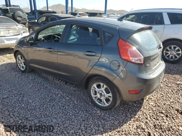 2015 Ford Fiesta SE with VIN 3FADP4EJ8FM221475, listed as a Copart auction lot 52404805 with 115,642 mi miles and Salvage Title. Bid and sale history available at carsss.com. Image 2.