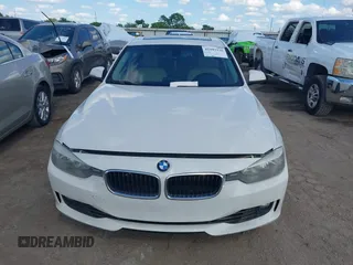 2014 BMW 3 Series 328i with VIN WBA3A5C5XEJ463938, listed as a IAAI auction lot 42103330 with 194,263 mi miles and . Bid and sale history available at DreamBid. Image 12.