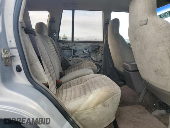 1994 Jeep Grand Cherokee Laredo с VIN 1J4GZ58S7RC356071, выставлен на аукционе Copart как лот 50851845 с пробегом 209 517 миль миль и Чистый • Clean title. История ставок и продаж доступна на DreamBid. Изображение 11.